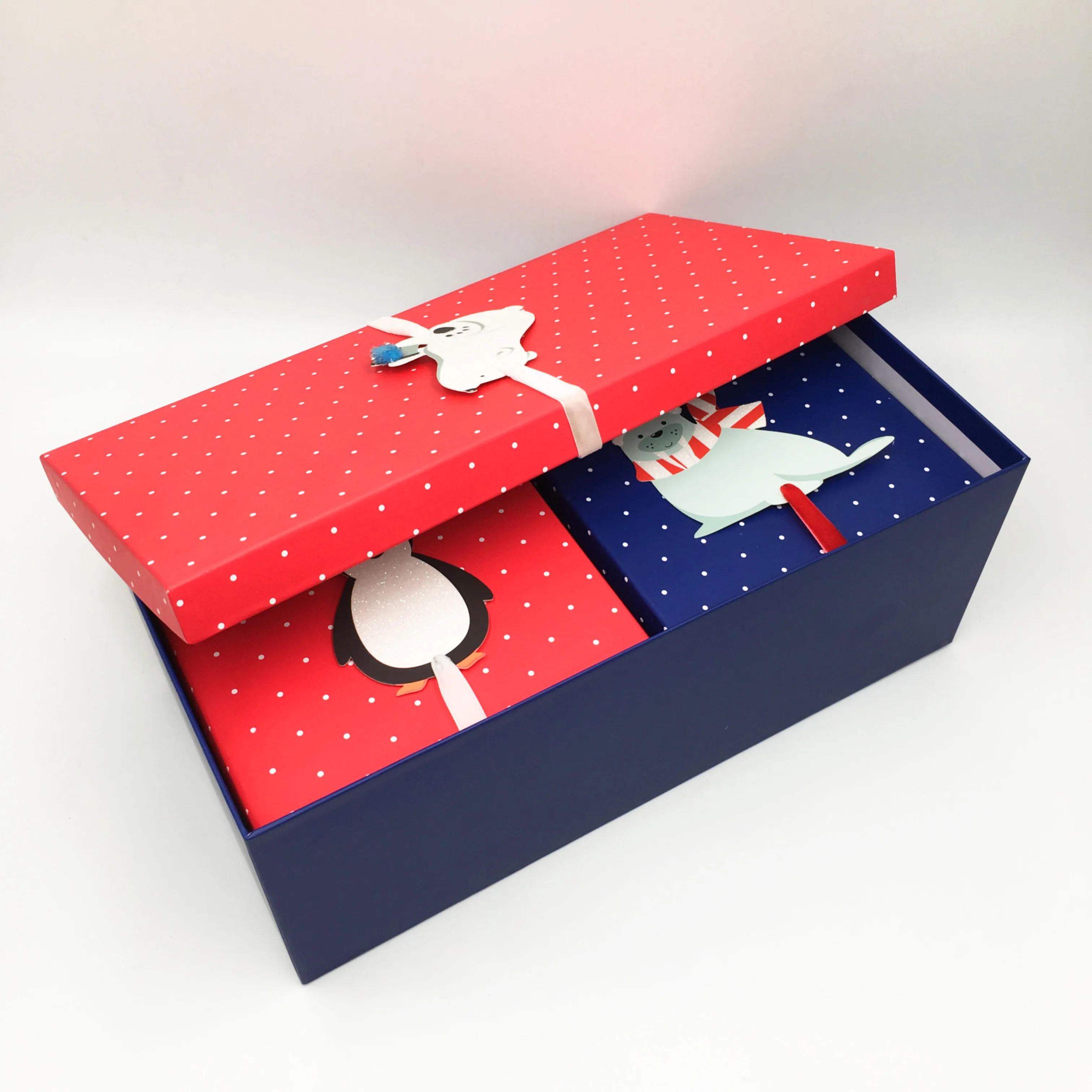 christmas packaging gift box with ribbon and inside two small