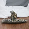 /product-detail/china-manufacturer-resin-bronze-buddha-candle-holder-bronze-resin-thai-buddha-statue-candle-holder--62296027288.html