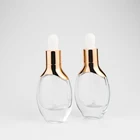 Hot sale luxury 20g 50g amber shading color cosmetic cream jar OEM glass bottler sliver gold dropper lid