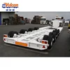 /product-detail/manufacturer-supply-4-axle-gooseneck-100ton-lowboy-dolly-semi-trailer-for-export-62296296126.html