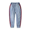 /product-detail/2020-spring-new-design-kids-jeans-pant-fashion-blue-boys-jeans-kids-jeans-with-red-side-stripe-62268103751.html