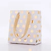 Wholesale luxury printed gold foil logo design custom candy gift packaging wedding door gift paper bag