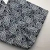 regenerated recycled cotton blue and white plant pattern printed fabric