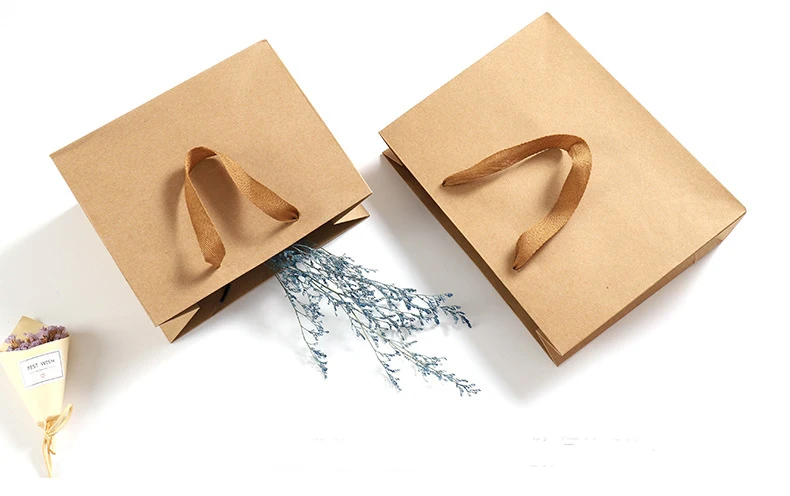 Paper packaging with luxury velvet lining and product dividers Kraft gift bag with protective foam insert for fragile items