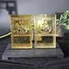 /product-detail/new-amber-color-crystal-liuli-tombstone-souvenir-with-buddha-figure-for-liuli-table-product-62403847668.html