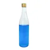 China 500ml round glass bottle for alcohol and pure water with aluminum cap
