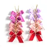 /product-detail/eco-friendly-plastic-bread-pretied-satin-ribbon-bow-with-elastic-loop-62358797235.html