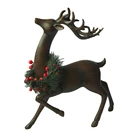 Home Decor Cast Iron Effect Resin Sitting Reindeer Statue with Polyresin Deer Figurine Christmas Decoration