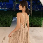 A new summer backless straps and sequined v-neck beach each holiday dress for women