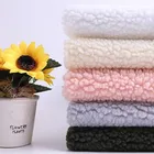 Hollow three-dimensional polyester lamb velvet fabrics manufacturer lamb wool fashion toy sweater