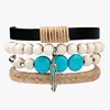 Popular vintage turquoise beaded wooded bead genuine leather alloy feather pendant bracelet