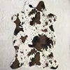 /product-detail/110-75-cm-animal-skin-faux-fur-cow-printed-cowhide-rug-for-sitting-room-62232077548.html