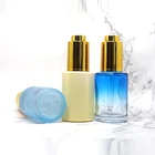 Blue Bottles Flat Shoulder Round Blue Glass 10ml 20ml And 50ml Essential Oil Dropper Bottles For Skin Care