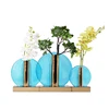 /product-detail/wholesale-decorative-metal-stained-glass-vase-interior-home-decorations-bud-vases-62413346820.html