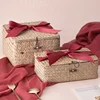 /product-detail/cocostyles-personalized-country-style-handmade-straw-woven-gift-basket-with-ribbon-for-rustic-new-year-gift-set-62297287986.html