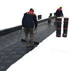 SBS modified bitumen roofing torch applying waterproofing membrane