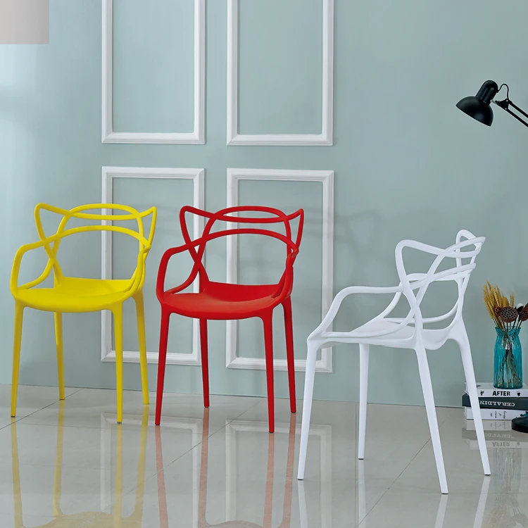 green stackable plastic chair