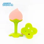 Baby two-color tooth gel safety silicone material yellow peach shape baby teether