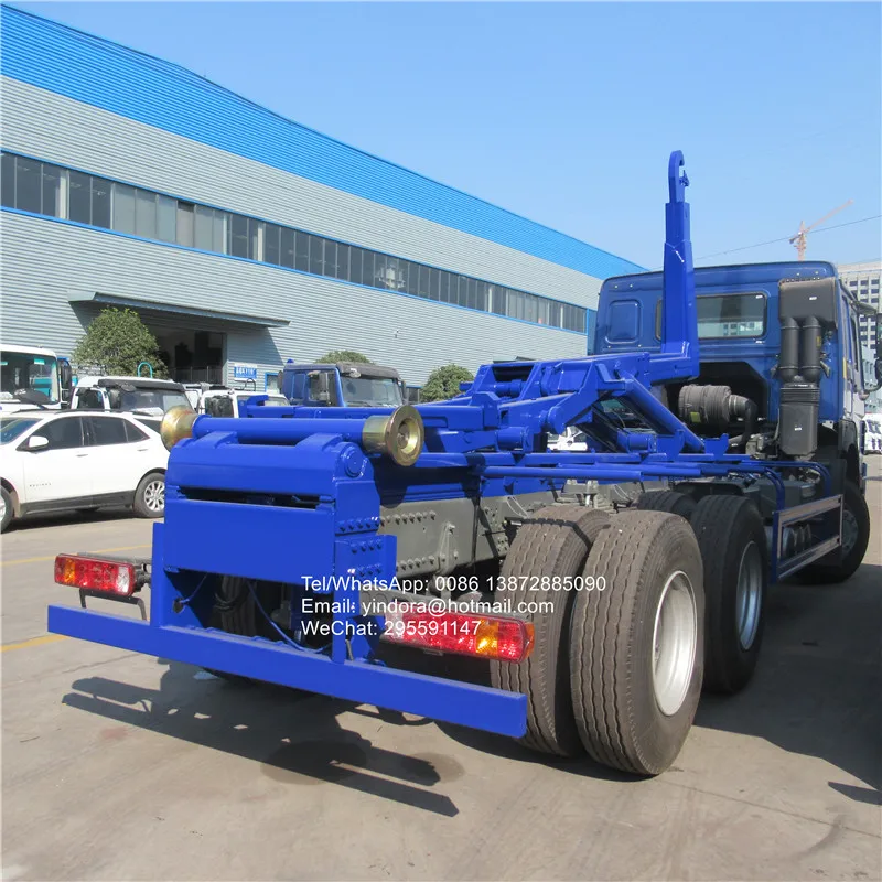 sinotruk howo新滚落后装载机回收废品收集集装箱钩车出售