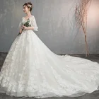 Gorgeous Appliques Chapel Train Lace Ball Gown Wedding Dress 2019 Sexy V Neck Long Sleeve Beaded Princess Bride Gown