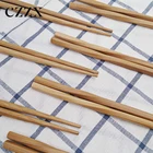 China manufacturer stocked eco-friendly reusable twist shape bamboo chopsticks for cooking and eating