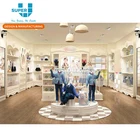 China Wholesale Supply Fashion Good Quality Wood Wall Baby Clothes Store Interior Design