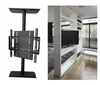 Rotating TV panel design allows watching ball-game from the bed or the sofa in the master bedroom partition wall TV bracket