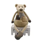 Stuffed patch bear toy with strip arms and legs