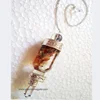 /product-detail/agate-chakra-chips-filled-bottle-pendulum-wholesale-gemstone-bottle-dowsing-pendulums-from-india-62010387839.html