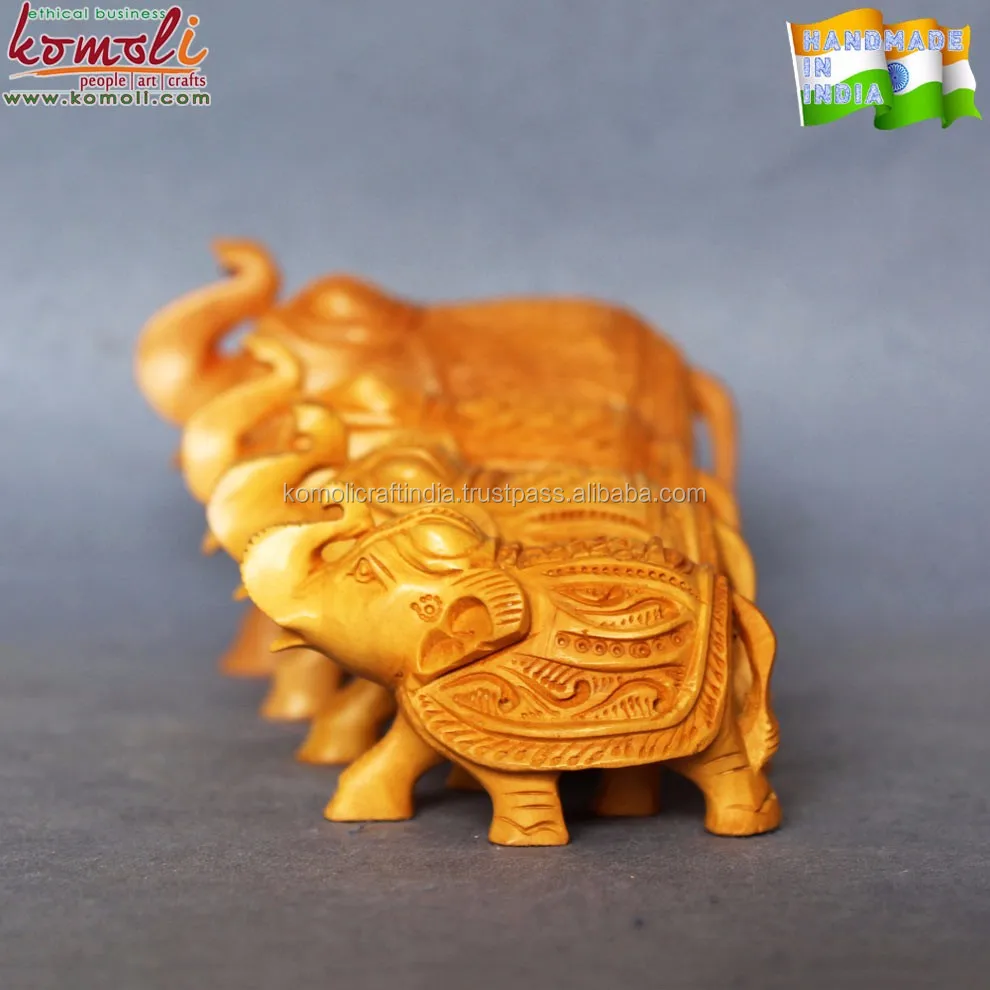 Wooden carved elephant hard wood set of 4 Komoli-11056-BR (1)