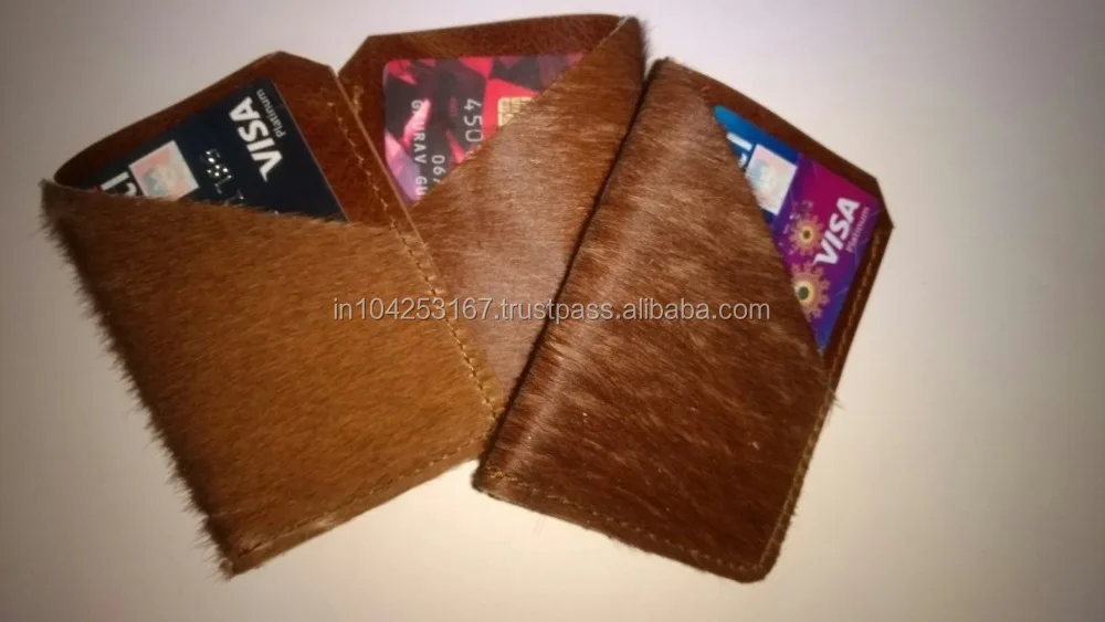 minimalist wallet in hair on leather