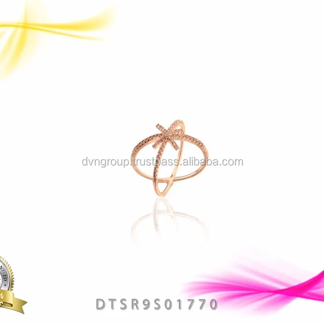 delicate "x" shape 14 kt gold plated cz studded