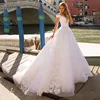 /product-detail/cap-sleeve-lace-appliqued-beading-wedding-dress-organza-bridal-gown-women-long-lace-up-ball-gown-with-sweep-train-2019-50046884019.html