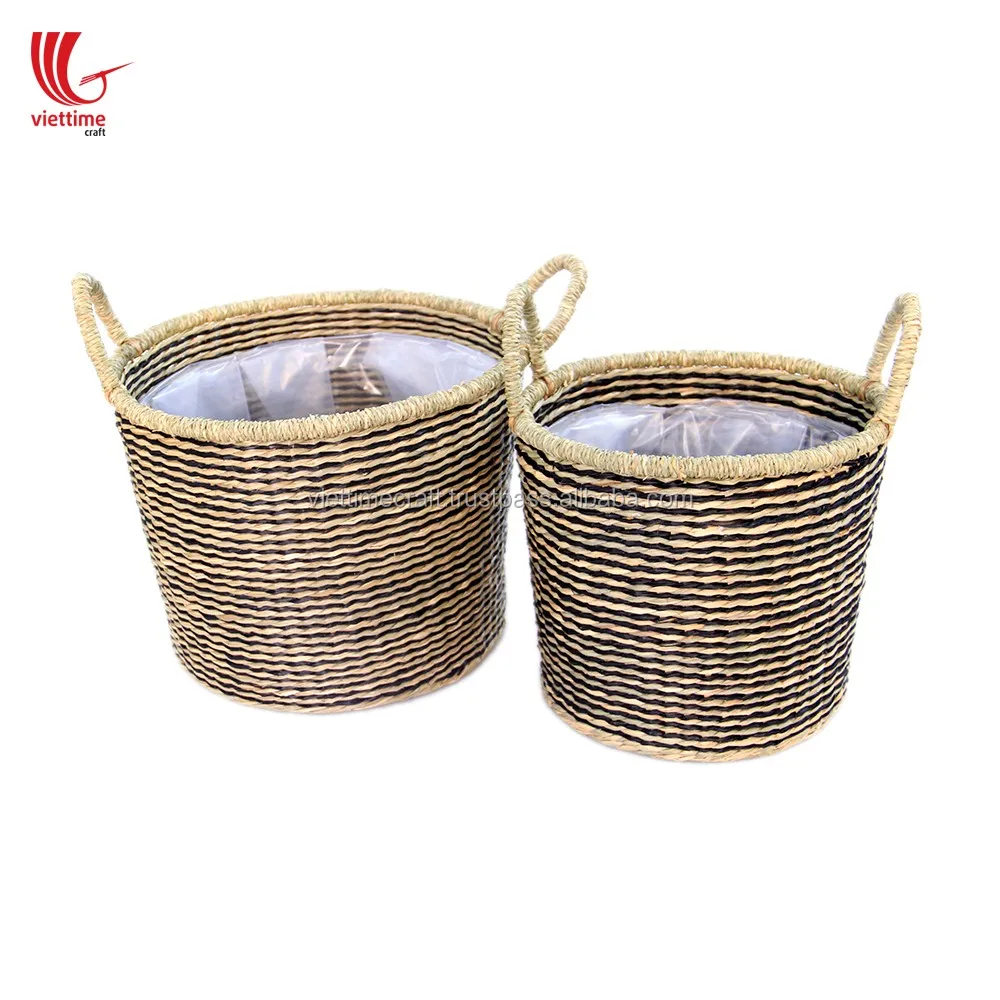 seagrass storage basket with handles and nylon lining inside