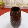 Vintage brown and yellow point detail lacquer vase from vietnam