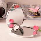 Zhejiang Cheap fashion heart shape customized design Mini handheld double side folding travel compact mirror