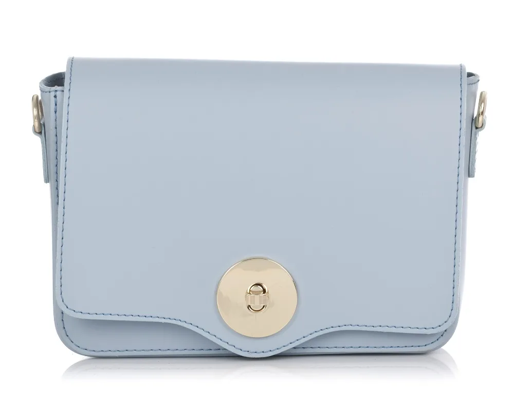 genuine leather handbag with flap closure