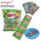 milk tablet candy in chocolate flavor with card toy