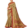 Add This Lovely Saree To Your Wardrobe In Unique Pale Khaki Color Paired With Pale Khaki Colored Blouse. This Saree Will Enhance