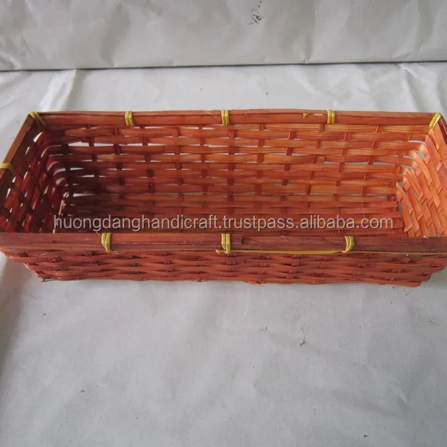 orange outside painted retangular bamboo basket