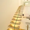 diy floating stairs with walnut wooden tread and frameless glass railing