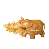 Indian souvenir handicraft set of four hand carved wooden elephants