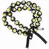 HAWAIIAN STYLE KUKUI NUT NECKLACE WITH HAND PAINTED YELLOW FLOWER