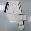 Men Side stripe bottom zipper drawstring sweatpants high streetwear jogger elastic waist track pants for men