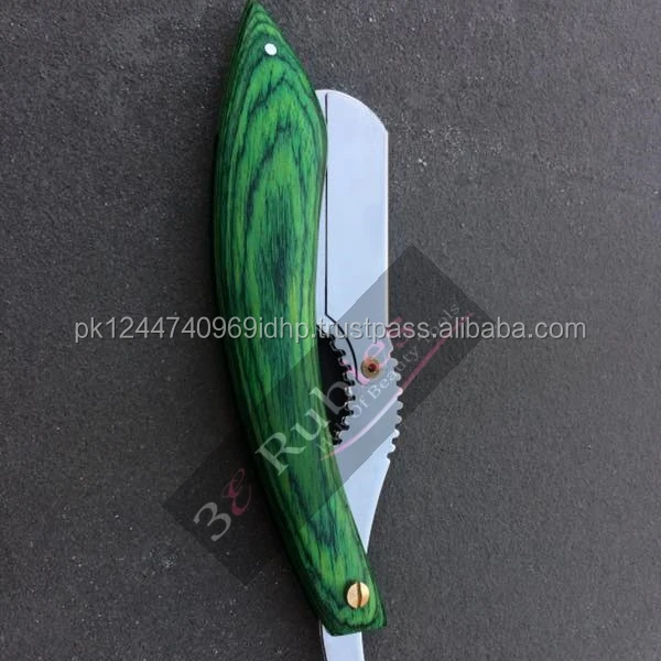 silver color straight edge barber shaving razor