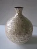 Vase with seashell inlay