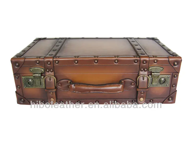 old style suitcase with wheels