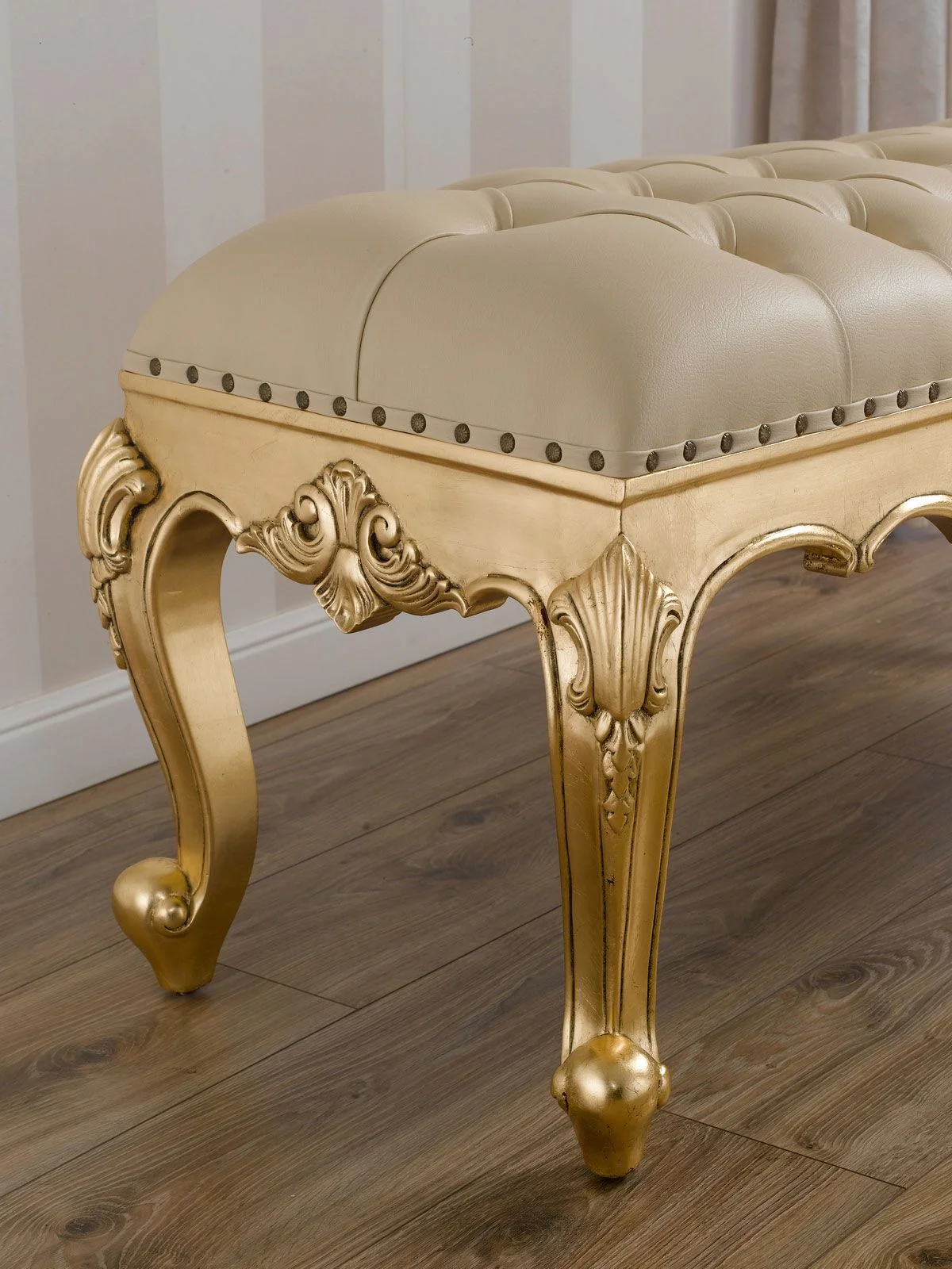 Add A Touch Of Luxury To Your Bedroom With This Gold Polish Wooden Bench With Leatherette Fabric