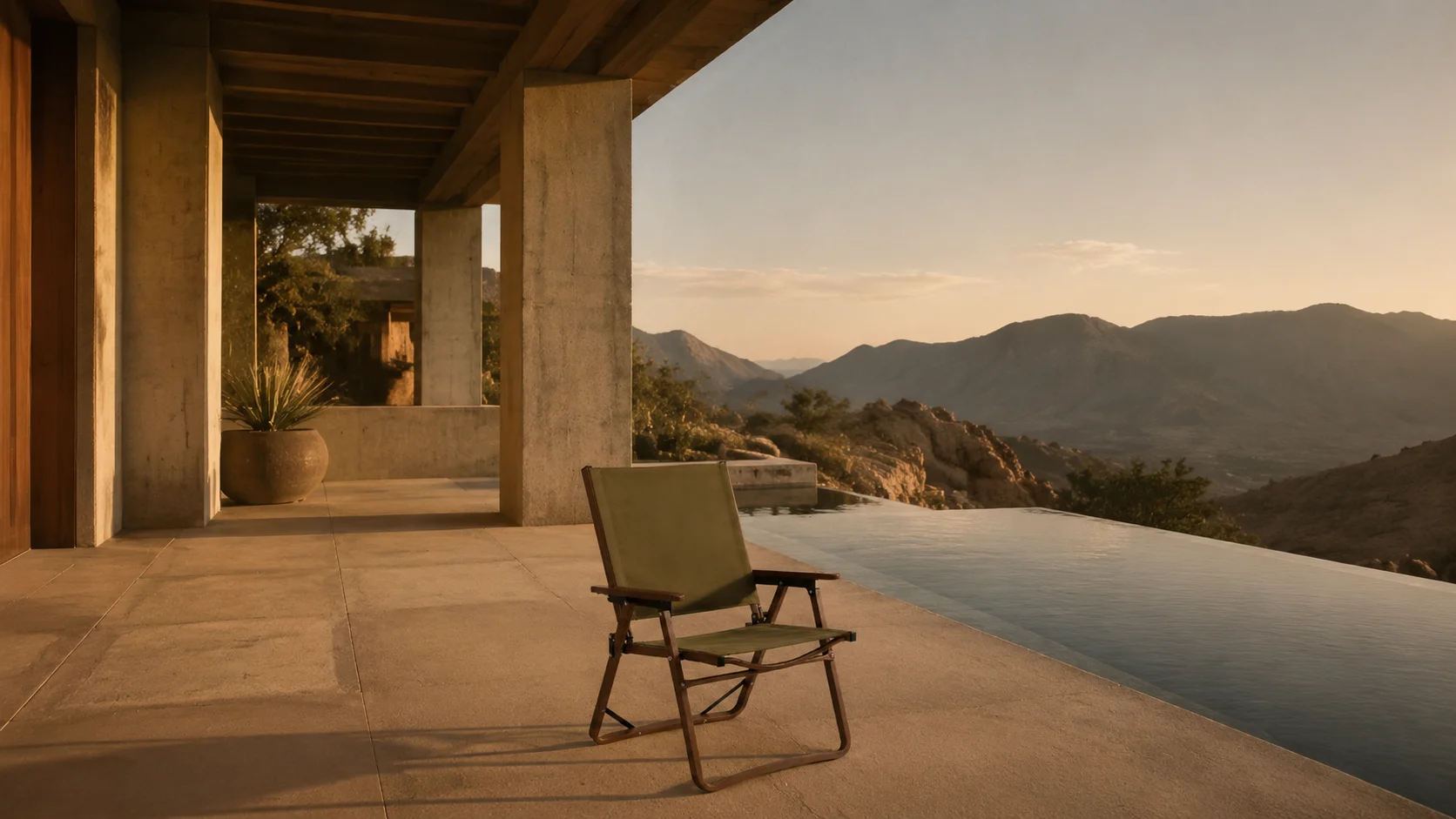 SummitSage Heritage Kermit Chair in Olive Green overlooking a mountain valley