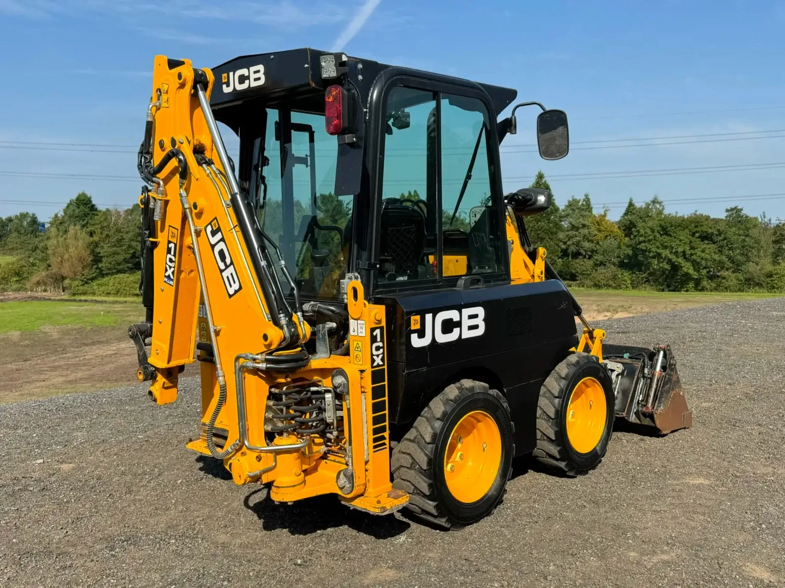 JCB 1CX Skid Steer Loader with Wheel/Crawler Moving Type 3 Ton Rated Load Mini Front Bucket and Pump-Drive a Backhoe Loader